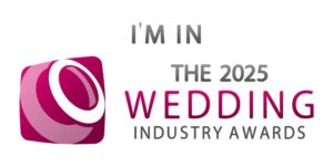 Logo featuring text "I'M IN THE 2025 WEDDING INDUSTRY AWARDS" with a stylized pink and purple camera aperture design on the left.